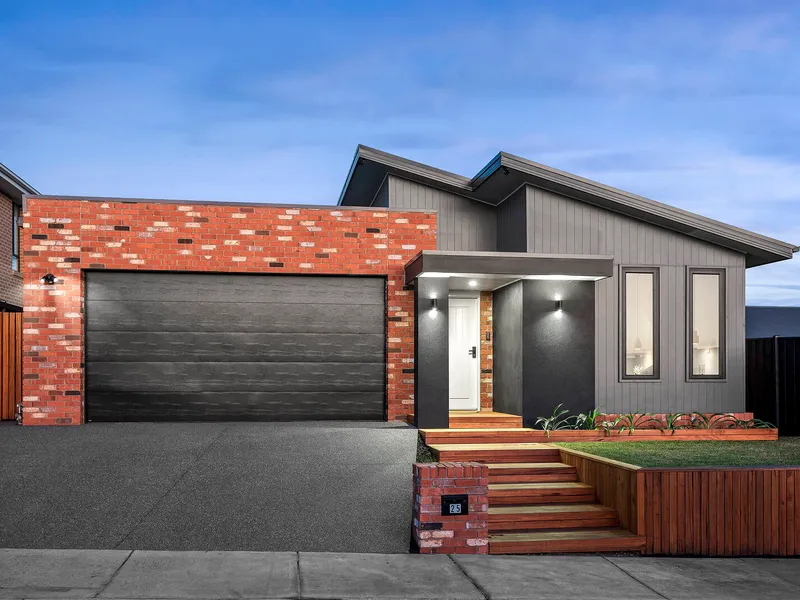 Exposed-aggregate concrete driveway and entry steps